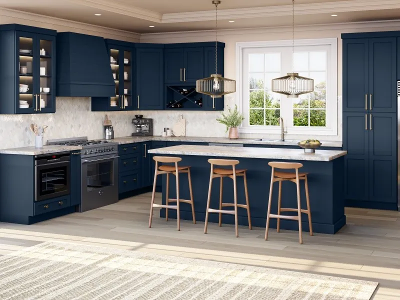 A well-designed kitchen displaying gray cabinets paired with white countertops, creating a fresh and inviting atmosphere.